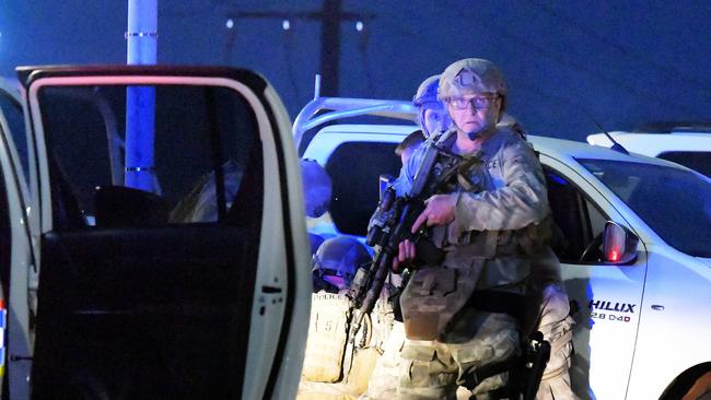 A man is held down by police in Darwin Picture: Keri Megelus