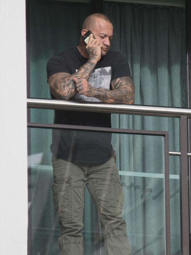 Dustin Martin's father on balcony of their hotel. Picture: Simon Runting