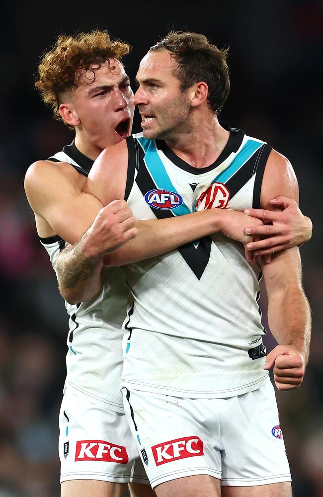 Logan Evans celebrates with Jeremy Finlayson. Picture: Quinn Rooney/Getty Images