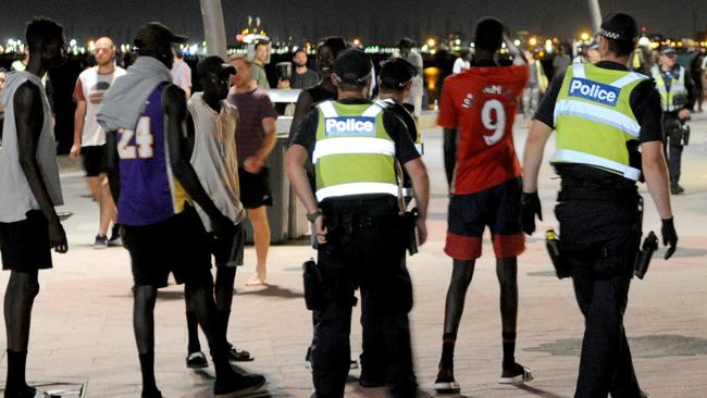 There was a strong police presence at St Kilda Beach last night after recent violent incidents in the area. Picture: Andrew Henshaw