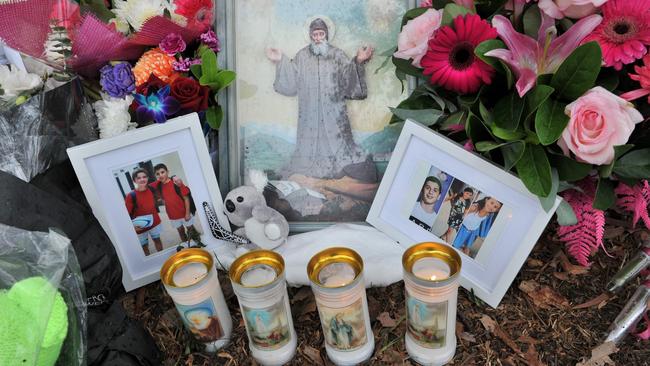 Tributes at the scene of the Oatlands tragedy. Picture: AFP