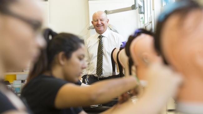 Bankstown’s TAFE campus is set for upgrades, says South West Sydney Institute director Peter Roberts (pictured with students at the campus). Photo: Melvyn Knipe