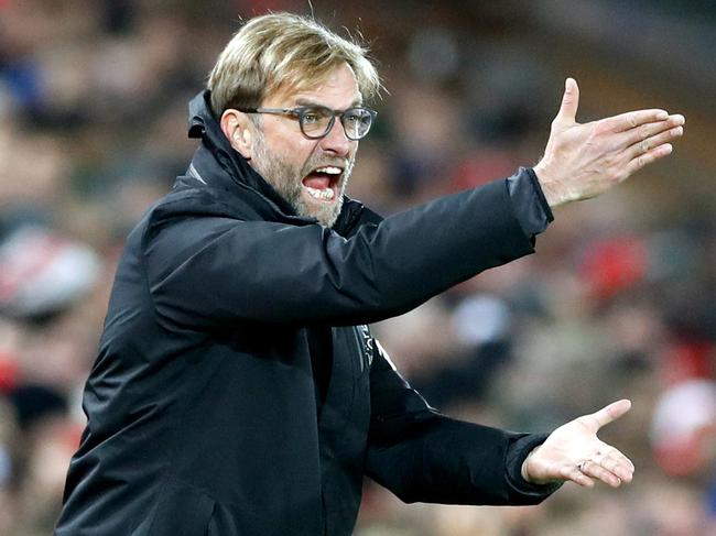 Liverpool manager Jurgen Klopp gestures on the touchline, during the English League Cup, quarter final soccer match between Liverpool and Leeds United, at Anfield, in Liverpool, England, Tuesday Nov. 29, 2016. (Martin Rickett/PA via AP) between