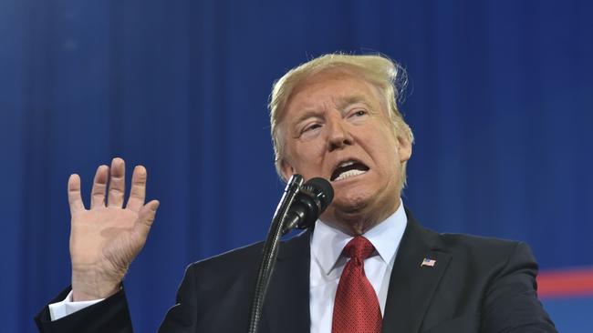 US President Donald Trump speaks to auto workers at American Center for Mobility in Ypsilanti, Michigan on March 15, 2017. (AFP PHOTO/Nicholas Kamm)