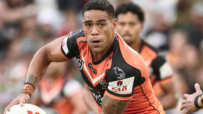 SYDNEY, AUSTRALIA - MAY 13: Joe Ofahengaue of the Tigers runs the ball during the round 11 NRL match between South Sydney Rabbitohs and Wests Tigers at Accor Stadium on May 13, 2023 in Sydney, Australia. (Photo by Brett Hemmings/Getty Images)