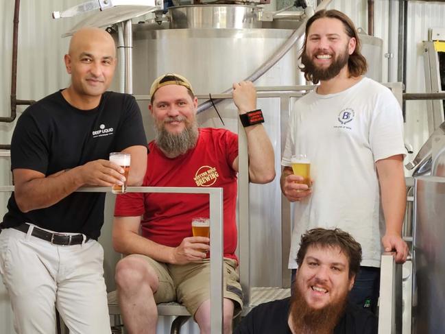 Three South Australian breweries - Barossa Valley Brewing, Western Ridge and Rehn Bier have united for a competitive edge in the craft brewing industry facing tough economic times that has seen several big operators enter voluntary administration.Left to right 1. Denham Co-Founder Deep Liquid (black tshirt) 2. David Henderson Co Founder, Western Ridge Brewery. 3. Matthew Barr. Head Brewer Barossa Valley Brewing 4. Josh Helbig, Owner Rehn Bier (sitting). Picture: Supplied