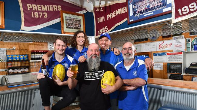 Port Noarlunga players Nick Steele and Jesse Waughan, South Coast Brewing Co brewer Scott Zrna, Cockledivers coach Clint Howes and complex manager Hugh Tedmanson with the new Cocklediver Ale, made for the footy club. Picture: AAP/Keryn Stevens