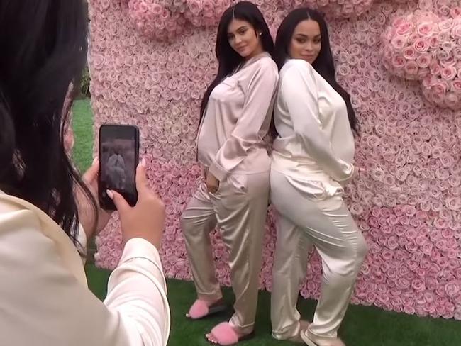 Kylie poses with a pregnant friend at her baby shower.