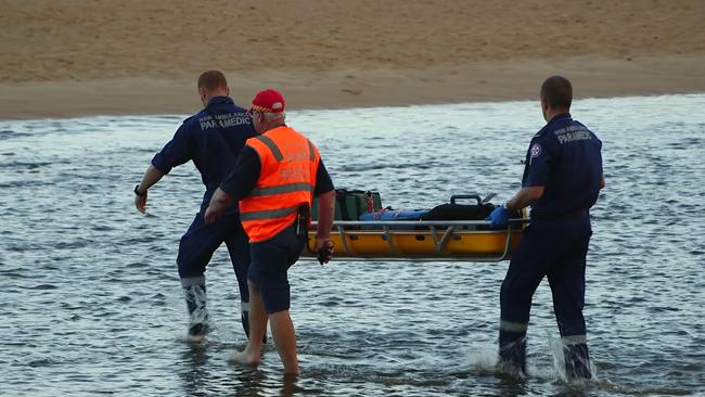 Rescue workers at the scene. Picture: Frank Redward