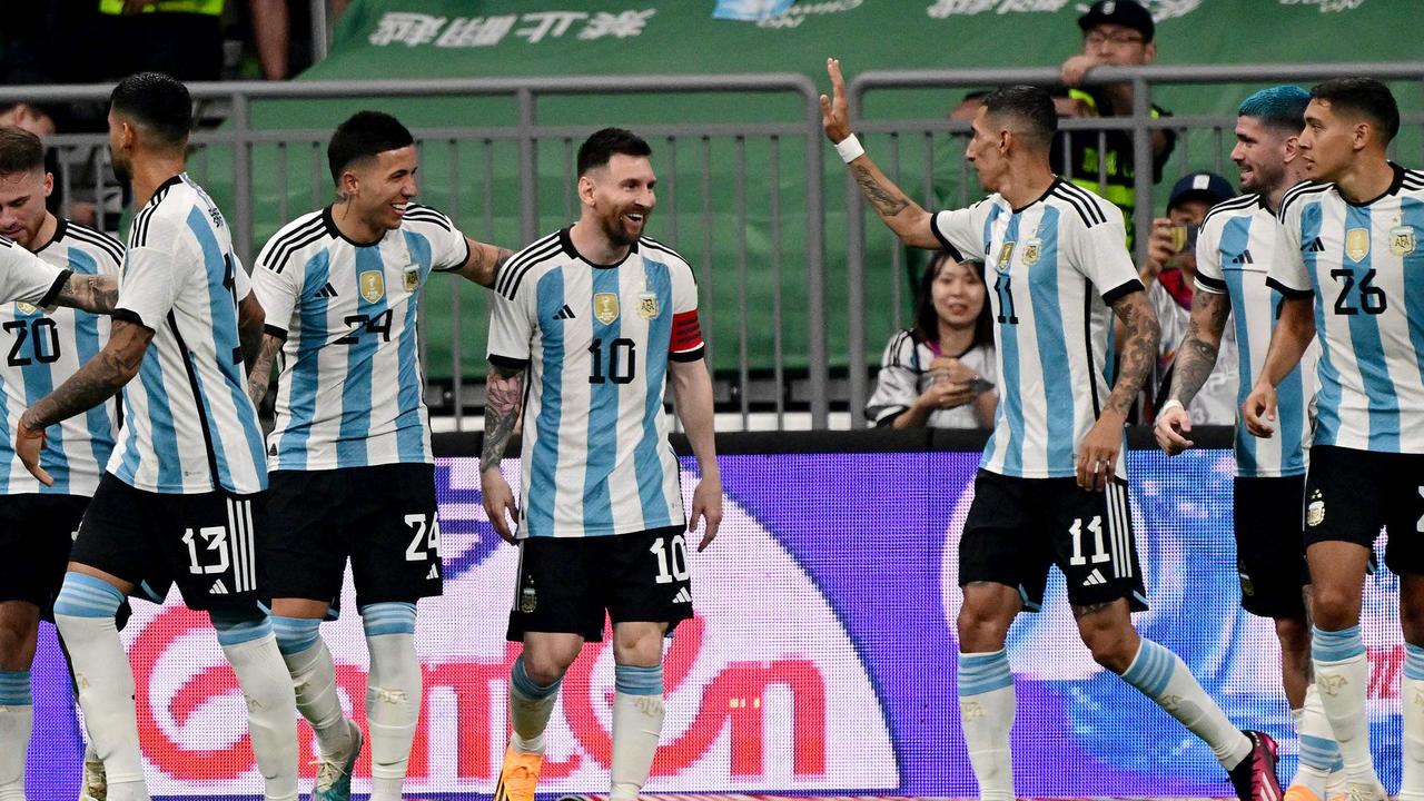 Argentina's Lionel Messi (4R) celebrates with his teammates during a friendly football match against Australia at the Workers' Stadium in Beijing on June 15, 2023. (Photo by Pedro PARDO / AFP)
