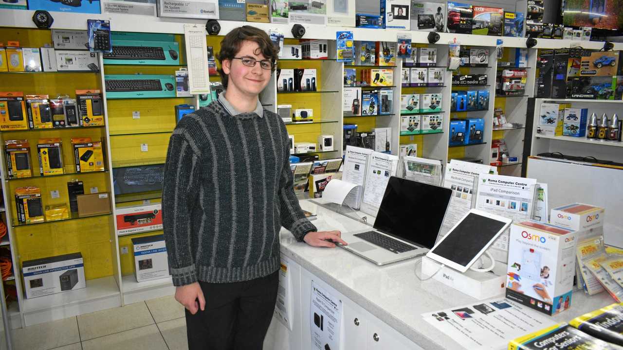 GOOD EXPERIENCE: Matt Blair gets an insight into working with technology at Roma Computer Centre. Picture: Laurel Richards