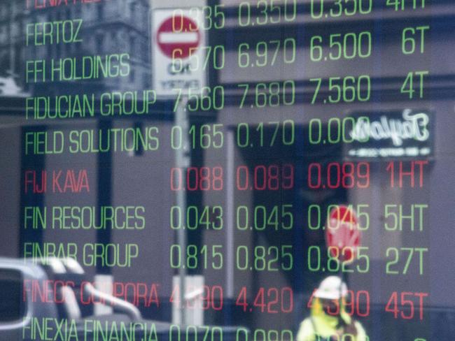 SYDNEY, AUSTRALIA - NewsWire Photos September 27, 2021: Information boards seen through the windows at the Australian Securities Exchange, Sydney. Picture: NCA NewsWire / James Gourley