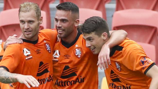 Bradden Inman of the Roar celebrates with teammates after scoring a goal during the Round 14 A-League match between Brisbane Roar and Melbourne City at Suncorp Stadium in Brisbane, Saturday, January 11, 2020. (AAP Image/Glenn Hunt) NO ARCHIVING, EDITORIAL USE ONLY