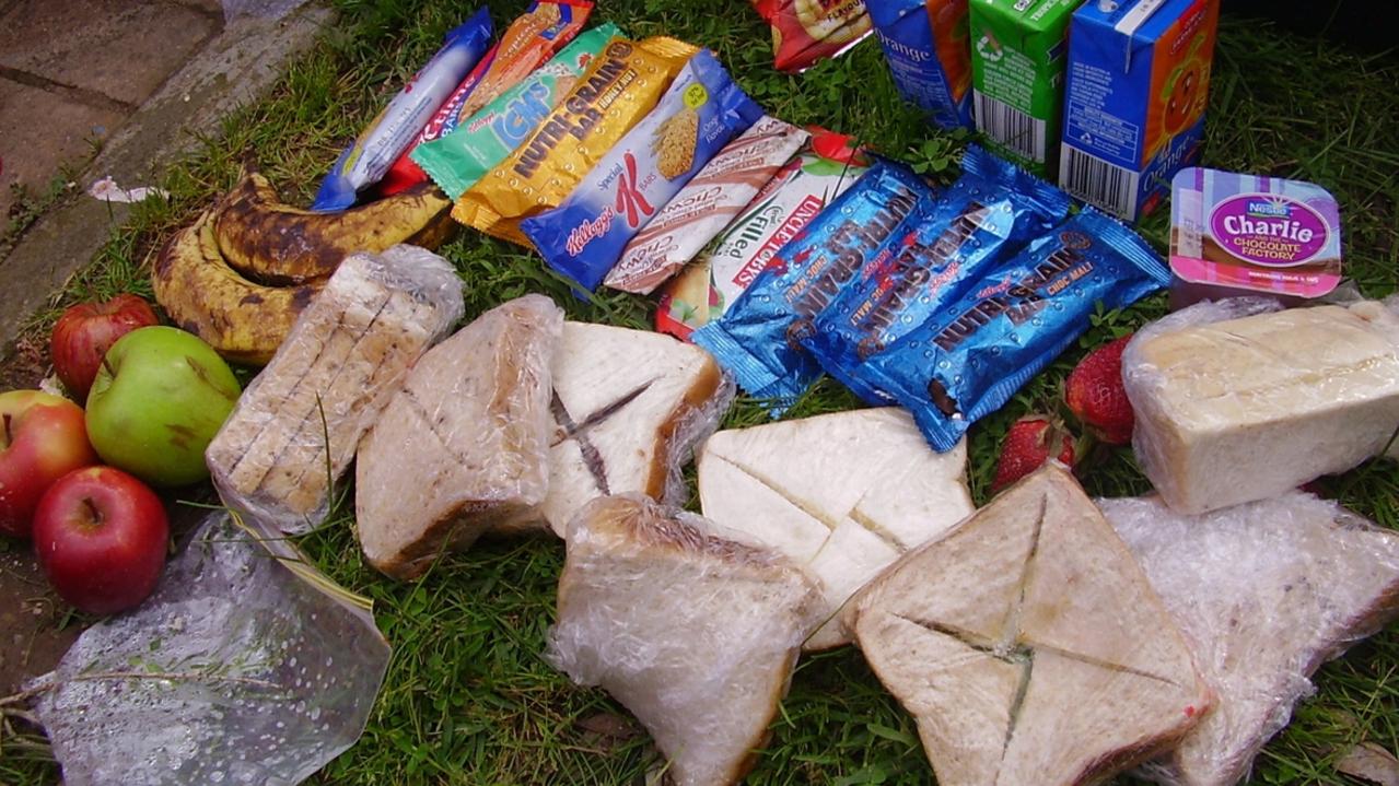 KESAB image of wasted children's lunch box food including wrapped sandwiches and uneaten snack foods found during rubbish audit at an SA school during "Wipe Out Waste" campaign 27 Jul 2007.  refuse disposal rubbish lunchbox