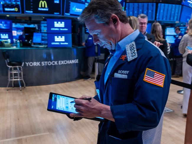 NEW YORK, NEW YORK - MARCH 03: Traders work on the New York Stock Exchange (NYSE) floor on March 03, 2025 in New York City. Despite growing concerns over proposed tariffs and continued tension with Ukraine, stocks rose on Monday, with the Dow up 70 points.   Spencer Platt/Getty Images/AFP (Photo by SPENCER PLATT / GETTY IMAGES NORTH AMERICA / Getty Images via AFP)