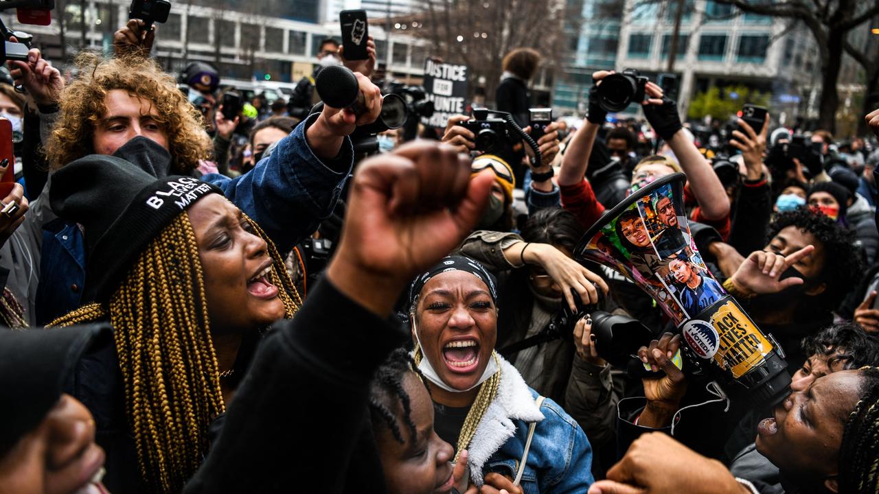 There were scenes of wild celebration following the verdict. Picture: Chandan Khanna / AFP