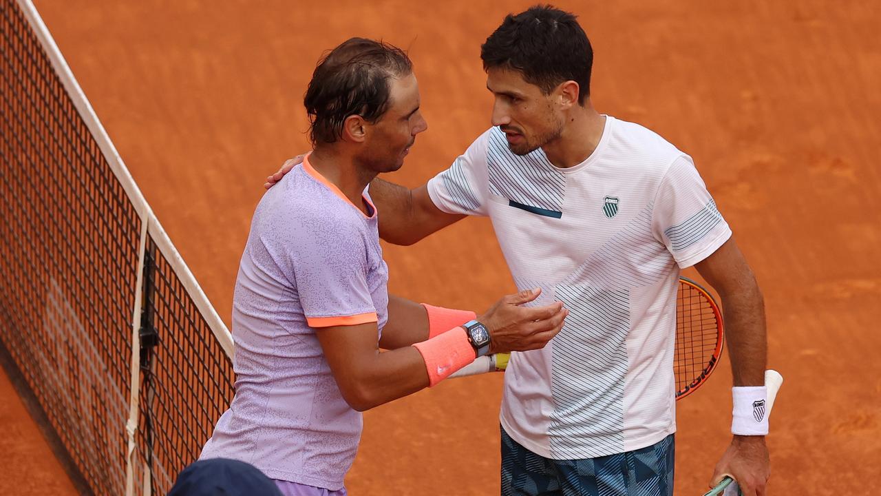 MADRID, SPAIN – APRIL 29: Rafael Nadal of Spain and Pedro Cachin of Argentina embrace following their Men's Round of 32 match during day seven of the Mutua Madrid Open at La Caja Magica on April 29, 2024 in Madrid, Spain. (Photo by Clive Brunskill/Getty Images)