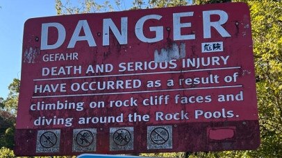 Safety signage at the Currumbin Rock Pools.