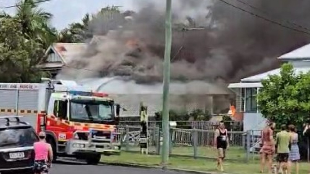 Firefighters battle a blaze which has engulfed a house at Maryborough early in the afternoon of Saturday, November 9, 2024.