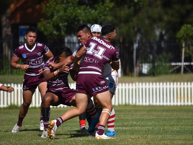 Phoenix Tauasa tackles Jacob Halangahu in the Harold Matthews Cup. Picture: Sean Teuma/NewsLocal