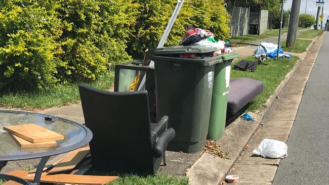 Kerbside rubbish left at Southport.