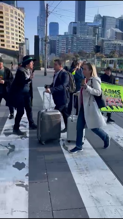 Protesters clash with people entering the Land Forces expo