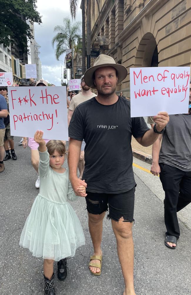 A man and young girl during the Brisbane march.