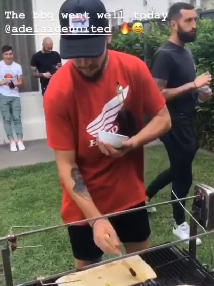 Adelaide United's Apostolos Stamatelopoulos cooks a barbecue for teammates after his red card against Wellington Phoenix. Picture Instagram