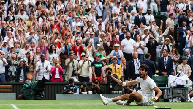 The whole place went nuts. Photo by Adrian DENNIS / AFP.