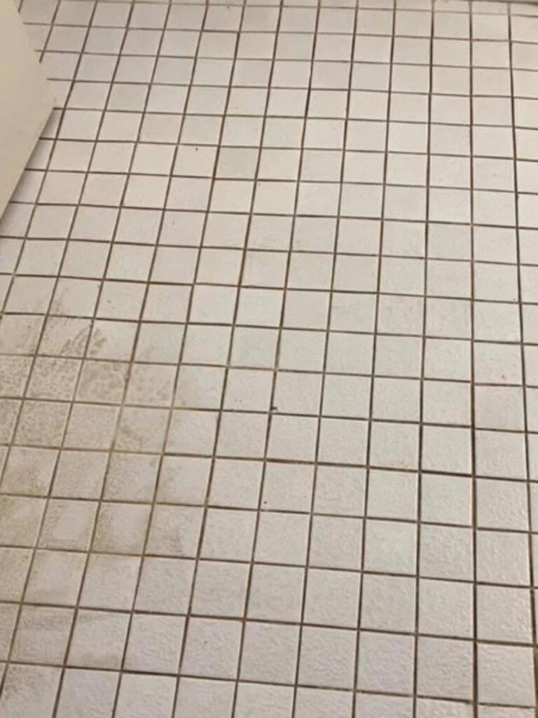 Another woman used a $10 Bunnings spray to transform her bathroom grout from this … Picture: Facebook/BunningsMums, Inspiration, Hacks, TipsandTricks