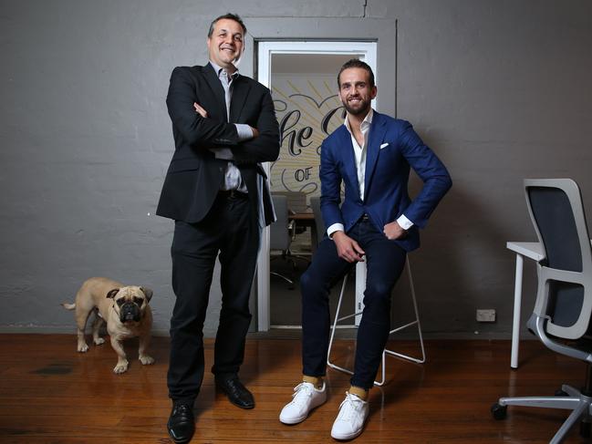 26 / 10/2018. Jack Watts, head of Bastion, an advertising and marketing agency with Andrew Varasdi, co-founder of Banjo, also an advertising agency. Photographed at Bastion offices in Surry Hills, Sydney with Jack's dog Fred. The two companies are merging. Britta Campion / The Australian