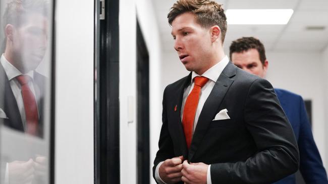 Toby Greene leaves the tribunal.