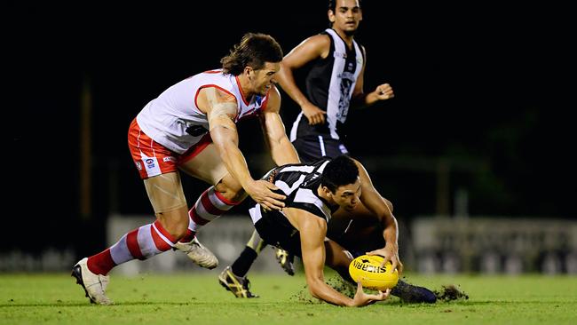 Aurrichio, left, was a ruckman for the Waratahs Football Club Men’s Premier League, and was regularly celebrated for his skill and imposing size