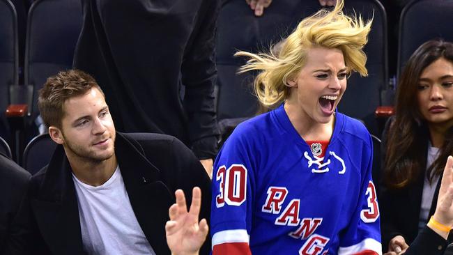 Margot Robbie and Tom Ackerley watch the Arizona Coyotes play the