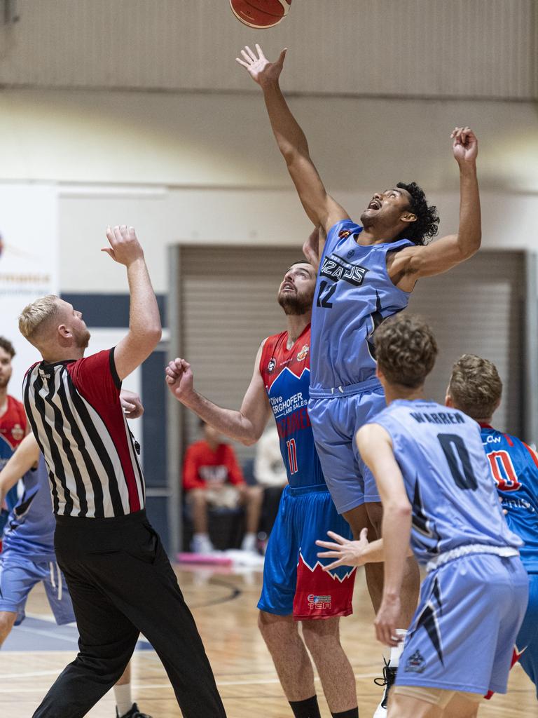 Clay Stowers wins the ball Northside Wizards against Toowoomba Mountaineers in QSL Division 1 Men round 2 basketball at Clive Berghofer Arena, St Mary's College, Sunday, April 21, 2024. Picture: Kevin Farmer