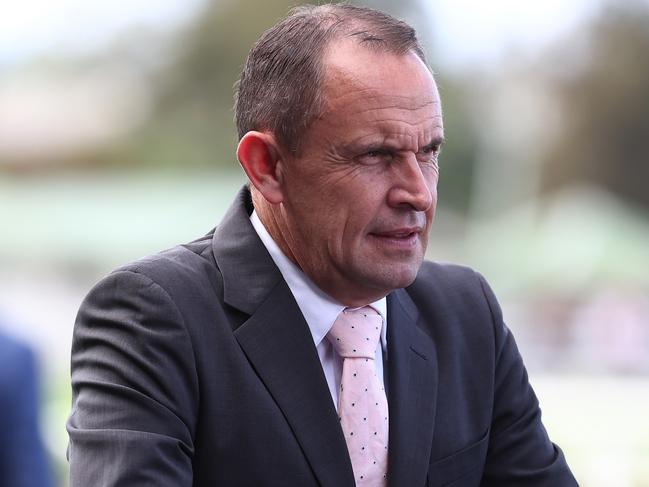 SYDNEY, AUSTRALIA - MARCH 16: Trainer Chris Waller looks on after James Mcdonald riding Lindermann wins Race 5 James Squire Sky High Stakes during "Chandon Ladies Day" - Sydney Racing at Rosehill Gardens on March 16, 2024 in Sydney, Australia. (Photo by Jeremy Ng/Getty Images)