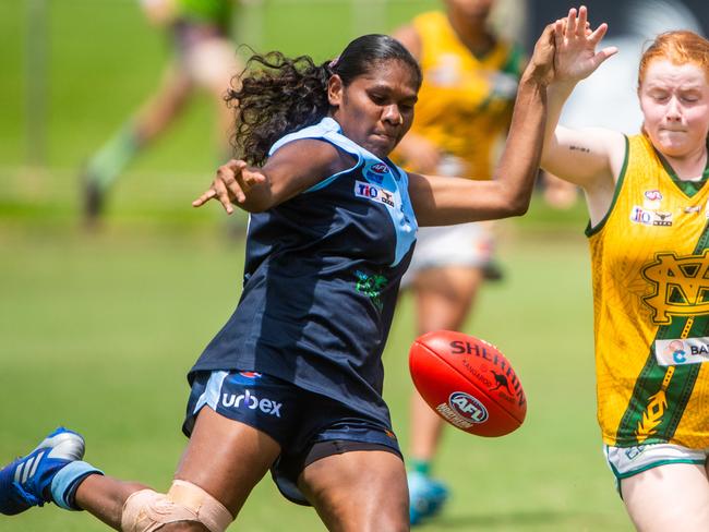 NTFL women's qualifying final: Darwin Buffettes v St Mary's at TIO Stadium. Ashanti Bush about to put a boot to the ball.Photograph: Che Chorley