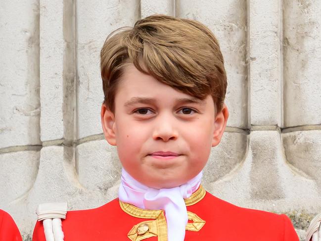 LONDON, ENGLAND - MAY 06: Prince George stands on the balcony of Buckingham Palace following the Coronation of King Charles III and Queen Camilla on May 06, 2023 in London, England. The Coronation of Charles III and his wife, Camilla, as King and Queen of the United Kingdom of Great Britain and Northern Ireland, and the other Commonwealth realms takes place at Westminster Abbey today. Charles acceded to the throne on 8 September 2022, upon the death of his mother, Elizabeth II.  (Photo by Leon Neal/Getty Images)