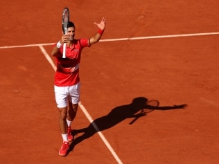 PARIS, FRANCE - MAY 27: Novak Djokovic of Serbia celebrates after winning match point against Aljaz Bedene of Slovenia during the Men's Singles Third Round match on Day 6 of The 2022 French Open at Roland Garros on May 27, 2022 in Paris, France. (Photo by Clive Brunskill/Getty Images)