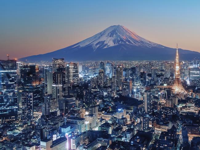 Tokyo city illuminated at sunset