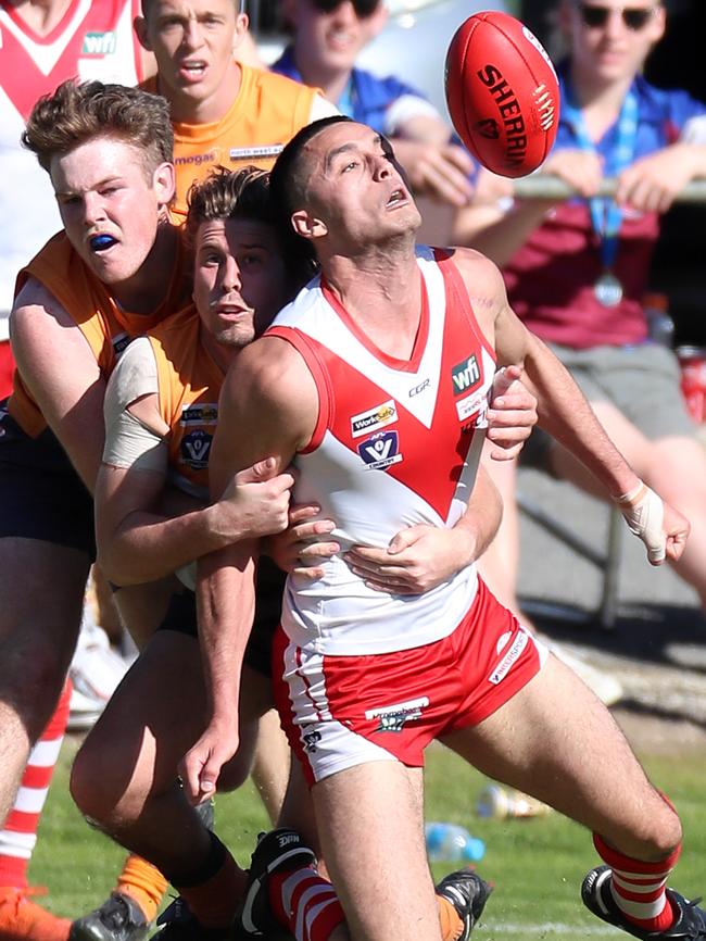 Ararat’s Tex Korewha is tackled without the ball.