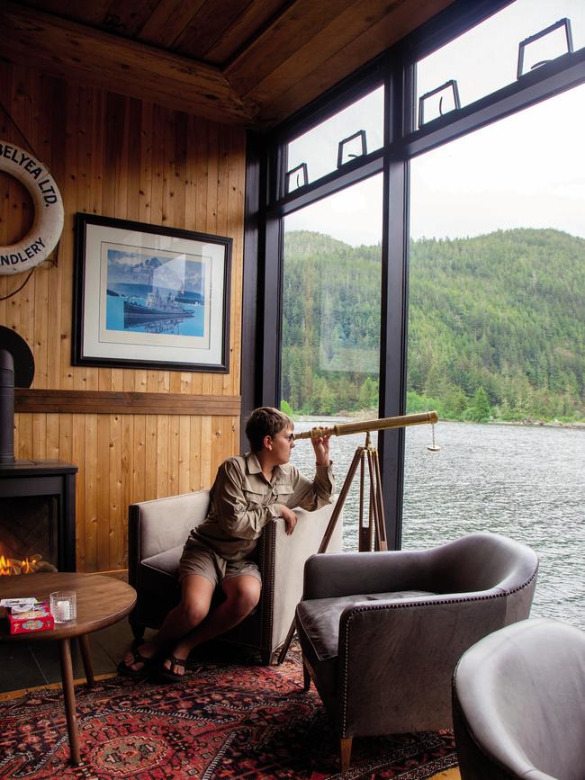 A young guest eyes the wilderness outside the lounge. Picture: Nikki Fenix