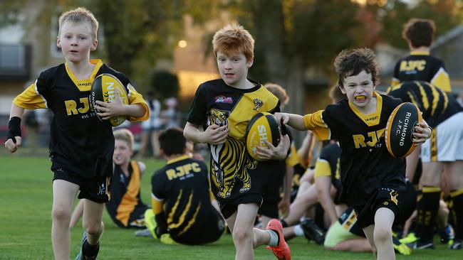 Richmond Junior Football Club players, from left, Lenny, Cade and Liam go through their paces. Picture: Andrew Tauber                        <a class="capi-image" capiId="362805c6c6558a4fd1ace7ff9429da99"></a>