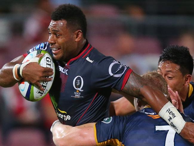 BRISBANE, AUSTRALIA - FEBRUARY 12: Samu Kerevi of the Reds is tackled by David Pocock of the Brumbies during the Super Rugby Pre-Season match between the Reds and the Brumbies at Ballymore Stadium on February 12, 2016 in Brisbane, Australia. (Photo by Chris Hyde/Getty Images)