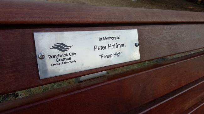 A bench and plaque bearing the name of homeless Maroubra murder victim Peter Hofmann.