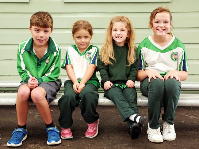 Year 5 student Flynn Pateras, kindy students Violet Potocki and Callie Shea, and year 5 student Sophia Rudens. Picture: Tim Hunter