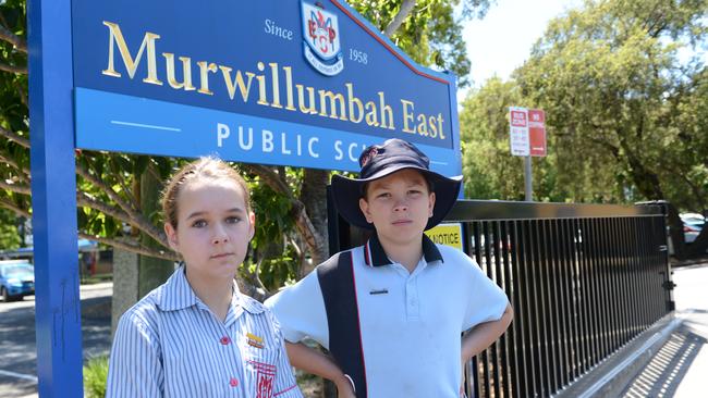 Murwillumbah East Public School students Zoe Johnson, Year 5, and Isaac Rose, Year 6, are unhappy with the state government's plans to merge four schools into one mega-facility. They are pictured from a media event earlier this month. Picture: Liana Boss