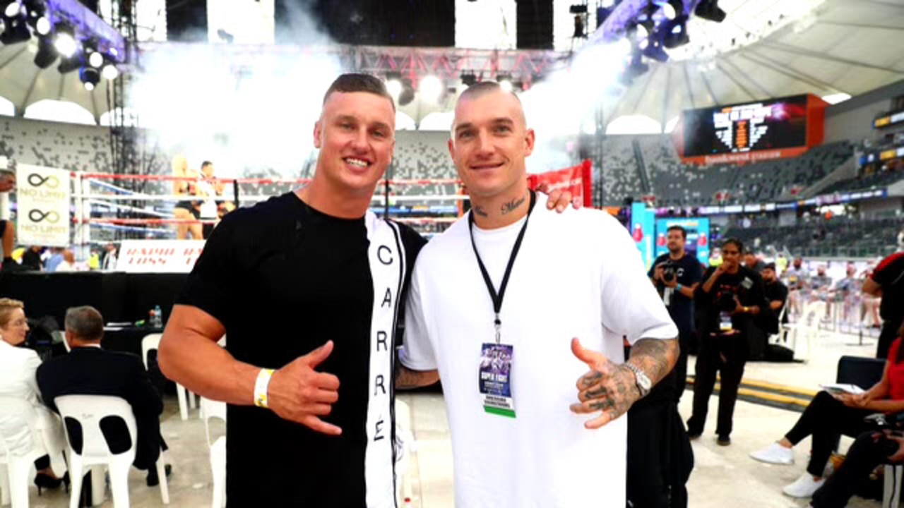 Dustin Martin (right) with NRL star Jack Wighton at the Paul Gallen/Mark Hunt boxing fight in Sydney.