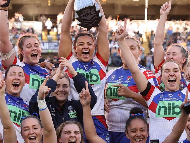 SYDNEY, AUSTRALIA - OCTOBER 02: The Knights celebrate with the NRLW Premiership Trophy after victory in the 2022 NRLW Grand Final match between Newcastle Knights and Parramatta Eels at Accor Stadium, on October 02, 2022, in Sydney, Australia. (Photo by Cameron Spencer/Getty Images)