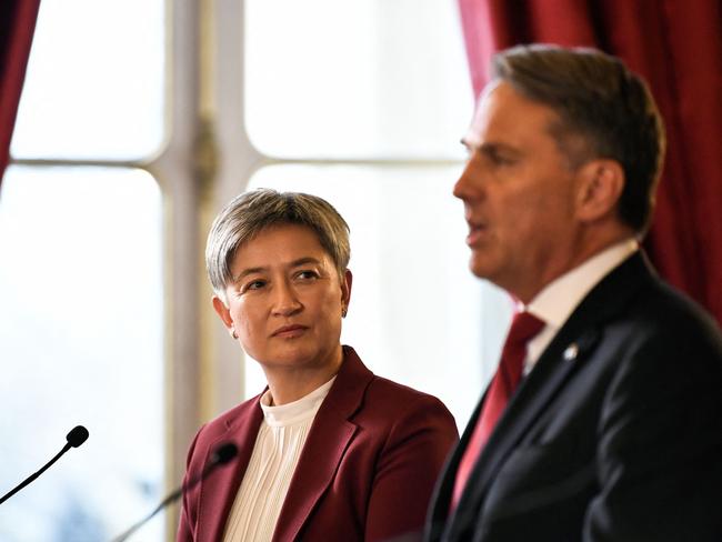 Australian Foreign Minister Penny Wong listens to Australian Defence Minister Richard Marles speaking during a press conference after a joint meeting with their French counterpart. Picture: AFP